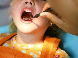 kid at dentist